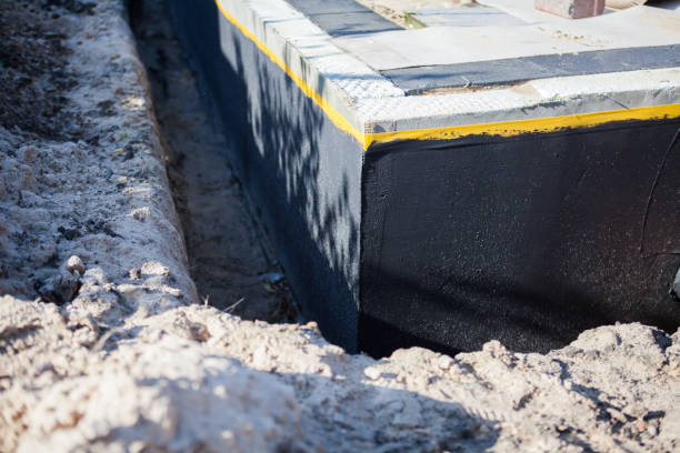 Professional Waterproofing technician working in Appleton, WI